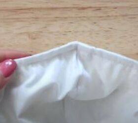 how to sew an easy face mask with adjustable straps free pattern, Pinching the nose wire on the mask