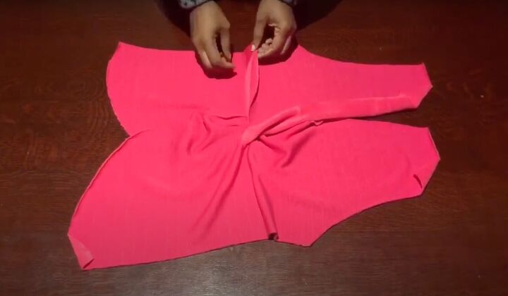how to easily sew a flattering twist front top or sweater, Pinning and sewing the open seams