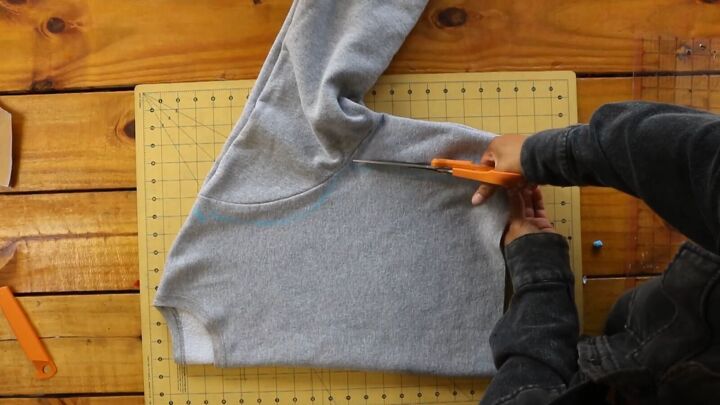 2 easy diy sweatshirt refashions making bandana flannel sleeves, Cutting off the sides and sleeves