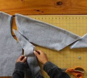 2 easy diy sweatshirt refashions making bandana flannel sleeves, Cutting away the excess fabric