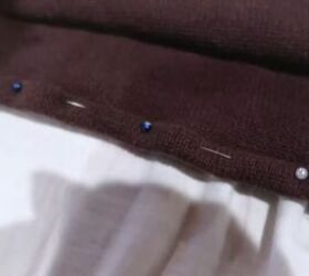 how to wear your boyfriend s clothes 4 men s items made new again, Hemming the bottom of the sweater