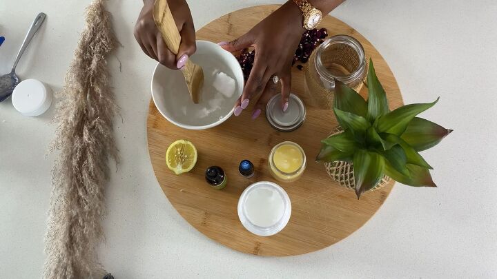 how to make a rejuvenating coconut oil epsom salt body scrub, Mixing the ingredients together