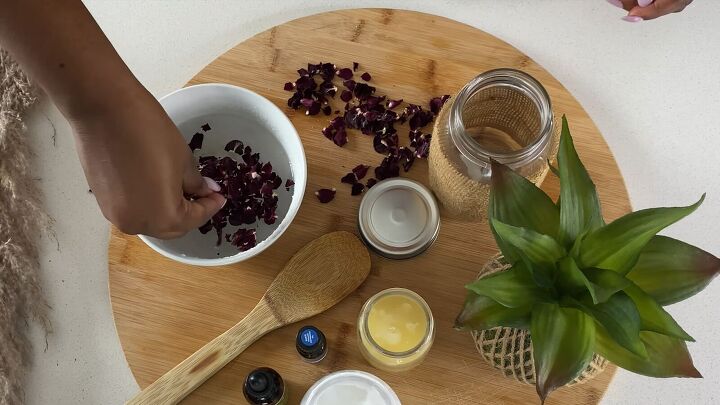 how to make a rejuvenating coconut oil epsom salt body scrub, Adding rose petals to the DIY body scrub