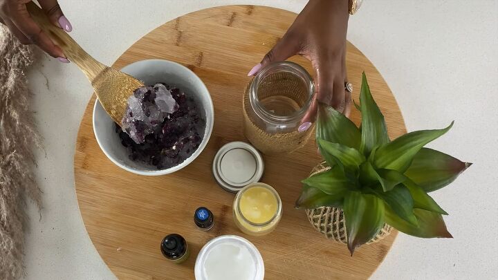 how to make a rejuvenating coconut oil epsom salt body scrub, Transferring the DIY body scrub to a container