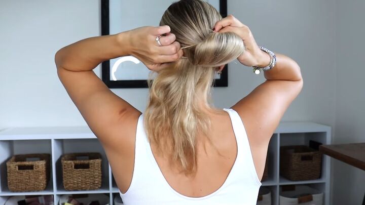 how to create a cute low bun updo in minutes easy tiktok hack, Pulling hair into a bun