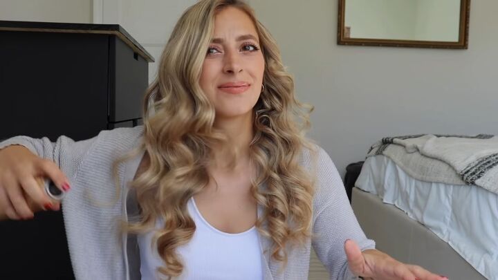 how to get hollywood heatless waves overnight using 6 bun makers, Applying hairspray to the waves