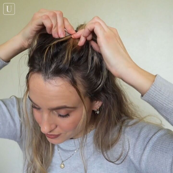 5 cute hairstyles for dirty hair that are super easy to do, Tying hair into a half ponytail