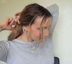 5 cute hairstyles for dirty hair that are super easy to do, Tying hair in a low ponytail