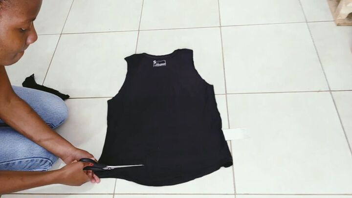 how to easily make a cute diy open back t shirt without sewing, Cutting off the bottom of the t shirt