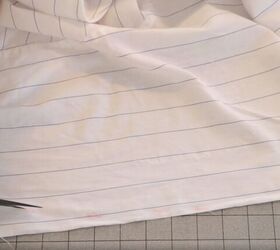 how to make a wrap top out of a shirt in 7 quick easy steps, Cutting off the excess fabric
