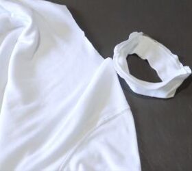 how to make a fun diy t shirt dress out of 4 thrifted men s t shirts, Removing the collar from the white t shirt