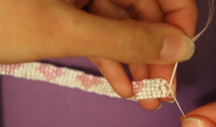 how to make a pretty diy valentines bracelet with beaded hearts, Tying knots to secure the end of the bracelet