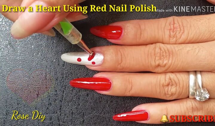 need valentine s nail art ideas try this red queen of hearts look, How to paint a heart on your nail