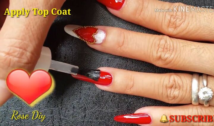 need valentine s nail art ideas try this red queen of hearts look, Sealing the Valentine s nail designs