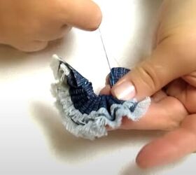 how to make cute diy denim bracelets cuffs out of old jeans, Sewing the ends of the denim together