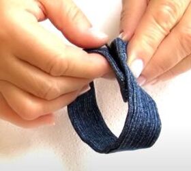 how to make cute diy denim bracelets cuffs out of old jeans, Sewing Velco to the ends of the denim cuff