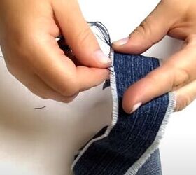 how to make cute diy denim bracelets cuffs out of old jeans, Fraying the edges of the DIY denim cuff