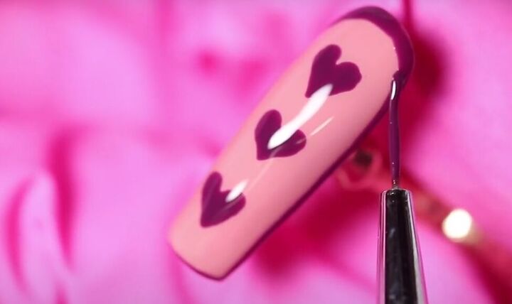 how to do adorable red purple and pink valentine s day nails, Outlining the edge of the nail