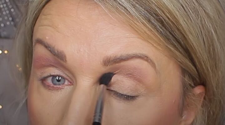 get ready for romance with this glam valentine s day makeup tutorial, Applying darker eyeshadow in the crease
