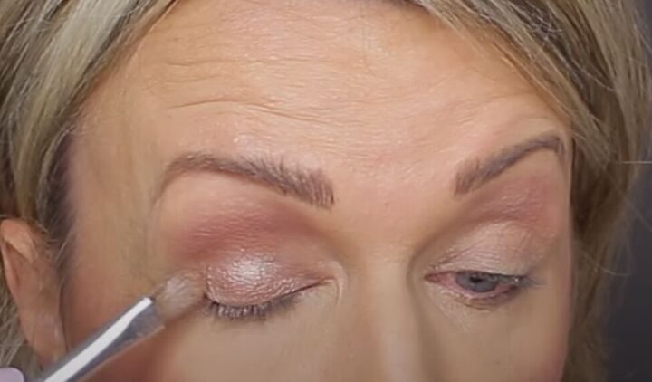 get ready for romance with this glam valentine s day makeup tutorial, Using a light shimmery eyeshadow on the lids