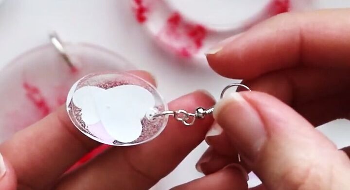 how to make cute diy valentine earrings with resin heart confetti, Attaching the resin to the earring fastening