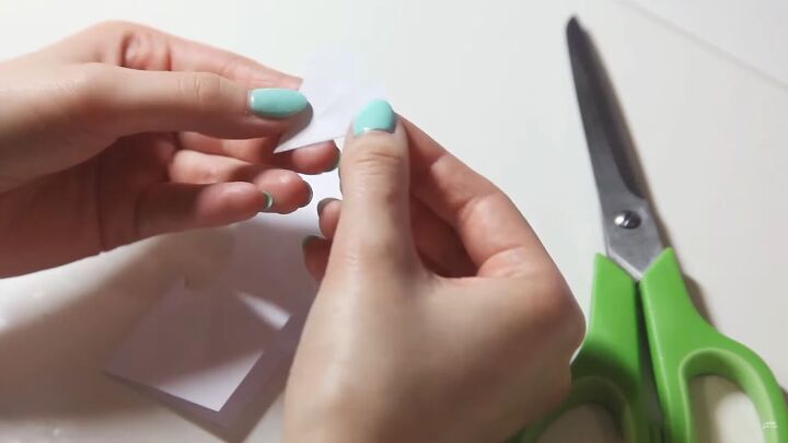 how to make a cute polymer clay heart pendant for valentine s day, Cutting out a heart template from paper