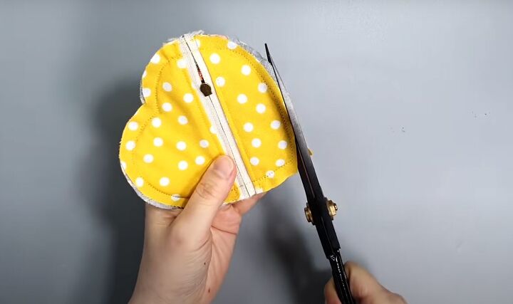want to sew a valentine s day gift try this mini heart pouch tutorial, Trimming the excess seam allowance