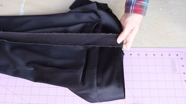 how to make diy tuxedo pants with an edgy denim stripe, Folding the strip end into the waistband