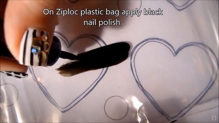 get in the mood for love with this black white valentine s nail art, Painting black nail polish onto a Ziplock bag