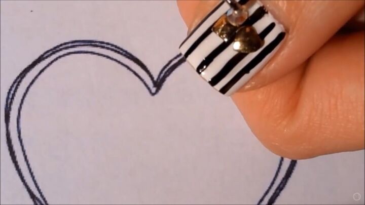 get in the mood for love with this black white valentine s nail art, Adding decorations to the nails
