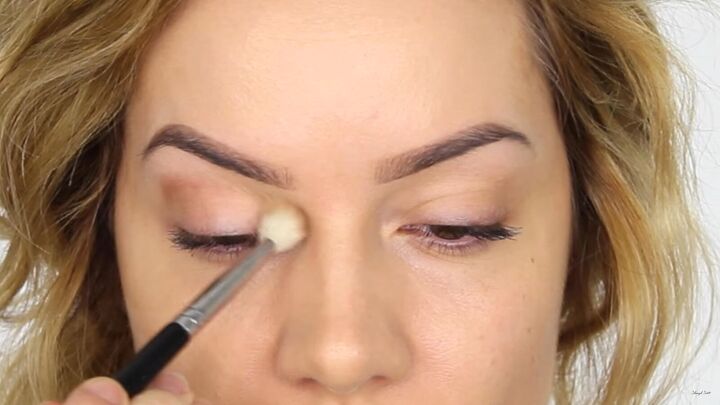 how to create a cool pink eye lip makeup look for valentines day, Applying medium brown eyeshadow to the socket