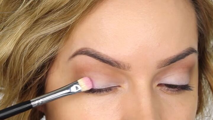 how to create a cool pink eye lip makeup look for valentines day, Packing on pink eyeshadow with a flat brush