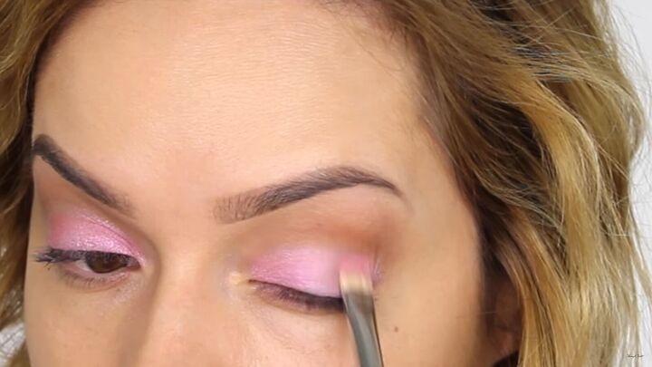 how to create a cool pink eye lip makeup look for valentines day, Applying pink pigments to the eyes makeup