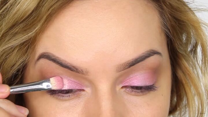 how to create a cool pink eye lip makeup look for valentines day, Applying pigment to the center of the eyelid