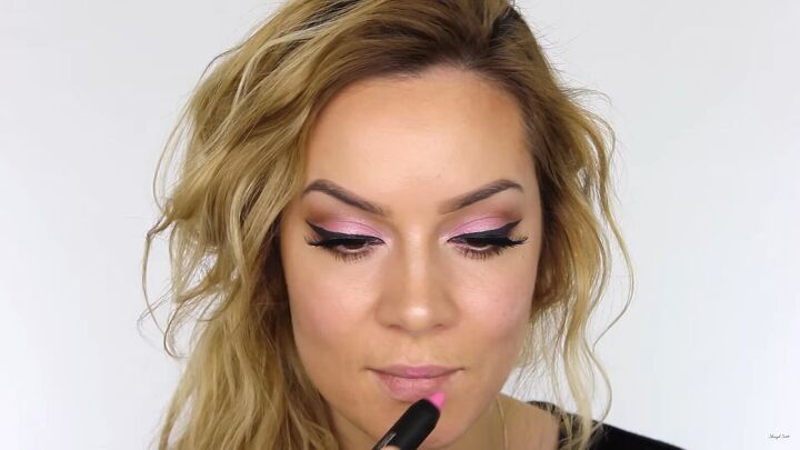 how to create a cool pink eye lip makeup look for valentines day, Applying pink lipstick for Valentine s Day