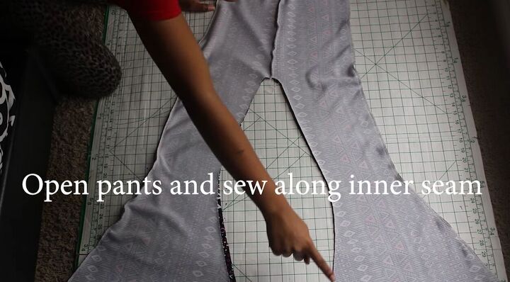 how to make trendy diy bell bottoms using leggings as a pattern, Pinning the inner seams ready to sew