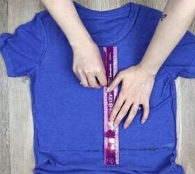 5 ways to make a diy crop top from a t shirt easy no sew tutorial, Drawing a line down the t shirt
