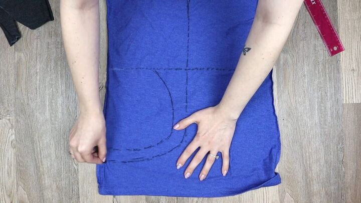 5 ways to make a diy crop top from a t shirt easy no sew tutorial, Drawing the pattern on the t shirt