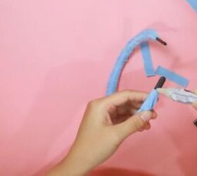 how to easily make a cute t shirt yarn headband by knotting, Applying glue to the ends of the headband