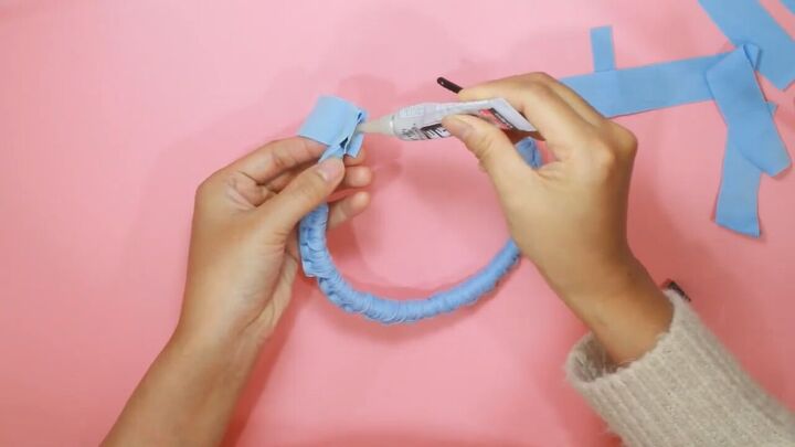 how to easily make a cute t shirt yarn headband by knotting, Sealing the ends with glue