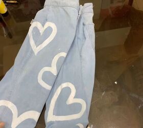 how to paint your clothes 3 fun painted jeans bag ideas, Painting white hearts on jeans