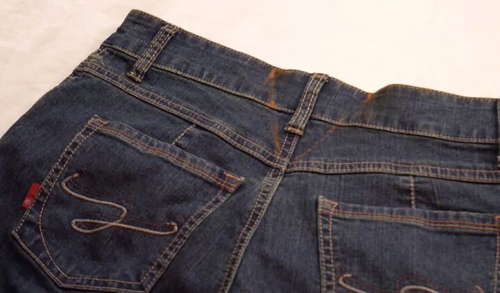 how to take in the waist of jeans by hand without a sewing machine, Drawing a V shape on the waistband