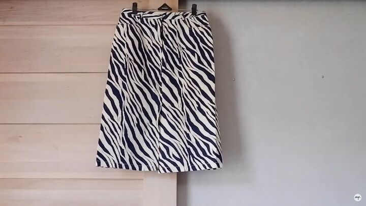how to make a cute diy baguette bag out of an old skirt, Zebra print skirt before the DIY