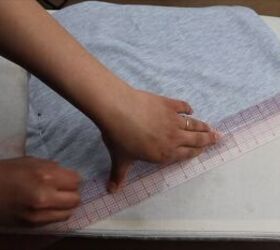 how to sew a hoodie jumpsuit loungewear set without a pattern, Marking a 1 inch line up from the fold