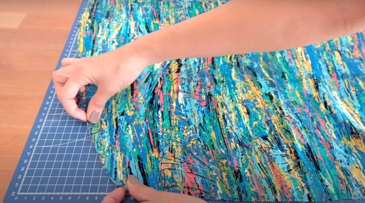 how to make a ruffle wrap skirt matching crop top from a maxi dress, Marking a curve on the skirt fabric