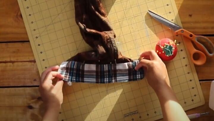 how to make a flannel shirt dress out of 4 old men s shirts, Pinning the cuff to the sleeve