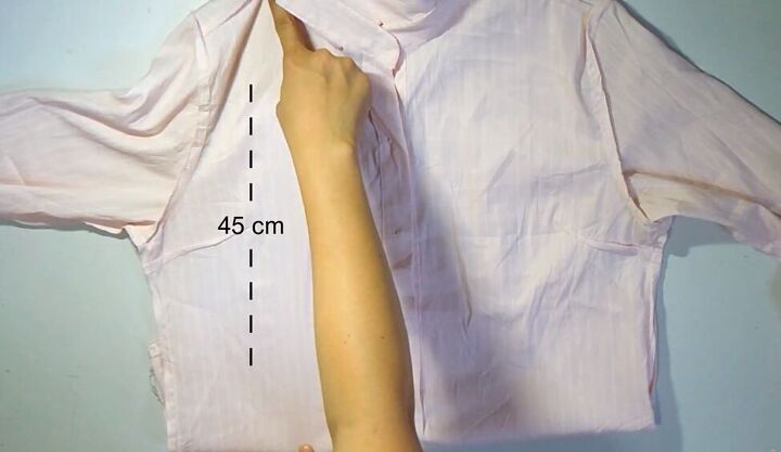 how to make a crop top with ruffles out of an old button down shirt, Measuring the marking the shirt