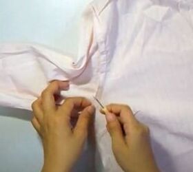 how to make a crop top with ruffles out of an old button down shirt, Using a seam ripper to remove the sleeves