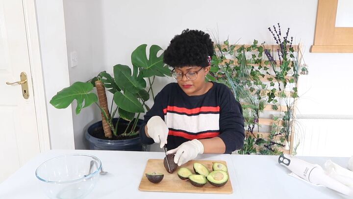 how to make avocado oil at home great for natural hair growth, Cutting the avocados in half