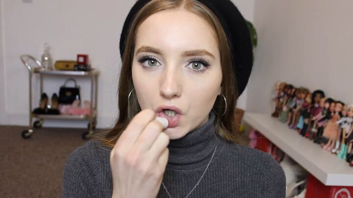 how to make lips look bigger carli bybel inspired lip makeup tutorial, Applying lip balm to dry lips